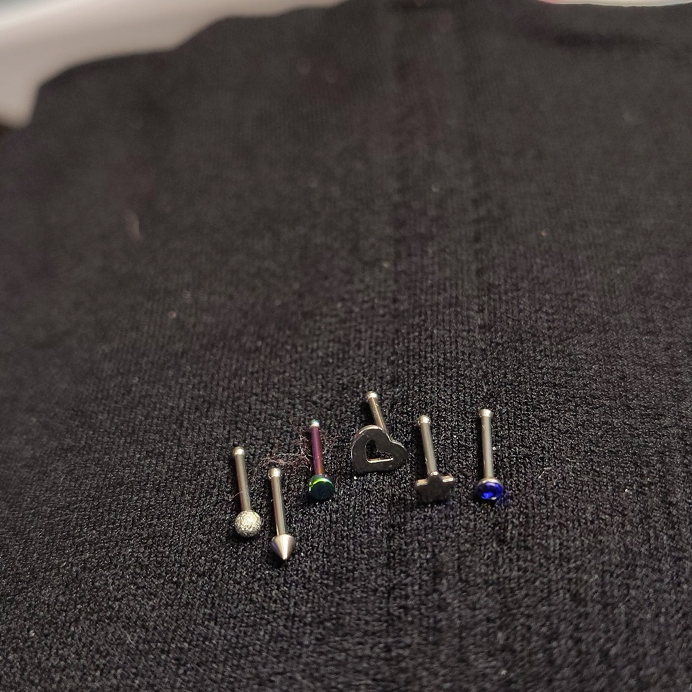 New 18 guage sterile nose rings